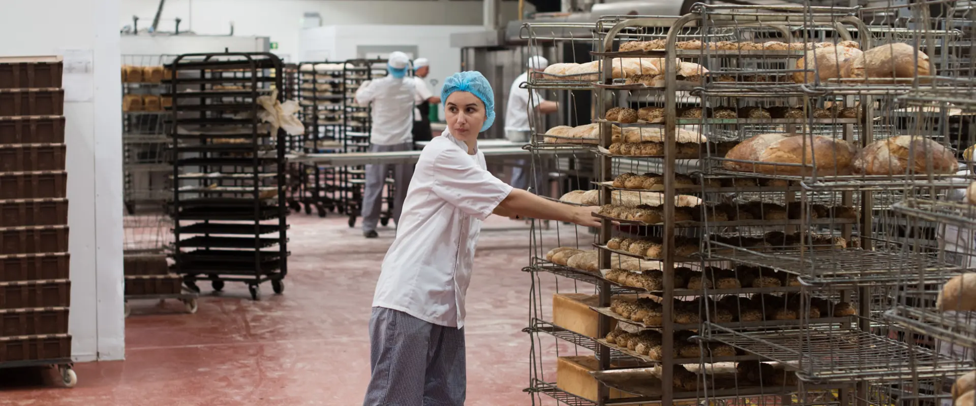 Flourish bakers preparing freshly baked loaves